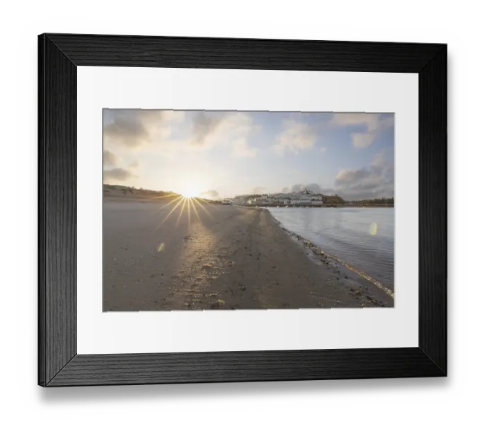 Framed Print : Sunrise on the Atlantic, skyline of a fishing village behind a harbour Framed Print : Sunrise on the Atlantic, skyline of a fishing village behind a harbour