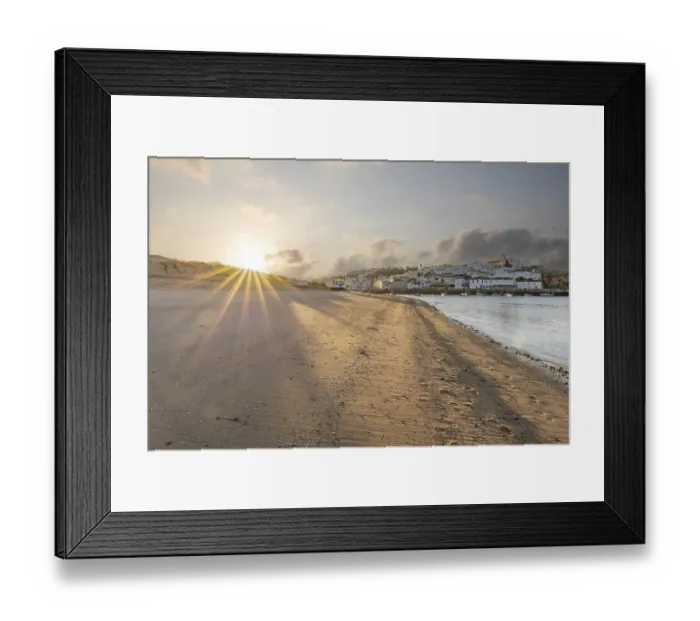 Framed Print : Sunrise on the Atlantic, skyline of a fishing village behind a harbour Framed Print : Sunrise on the Atlantic, skyline of a fishing village behind a harbour