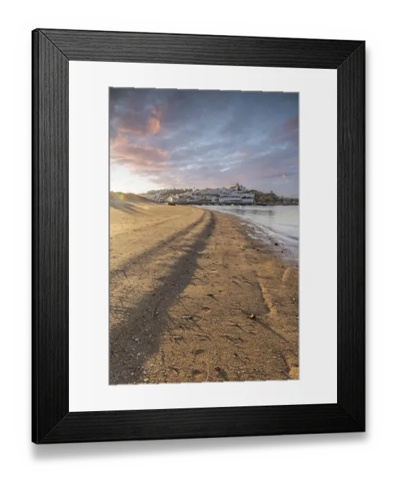 Framed Print : Sunrise on the Atlantic, skyline of a fishing village behind a harbour
