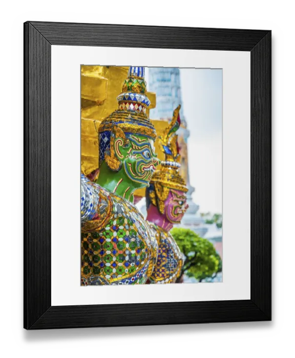 Framed Print : Colorful statue against colorful pagoda at Wat Phra Kaew temple Framed Print : Colorful statue against colorful pagoda at Wat Phra Kaew temple