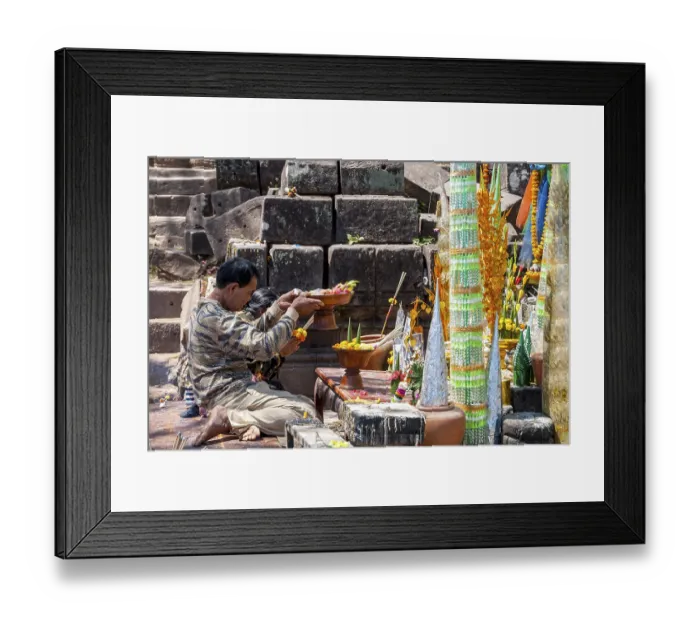 Framed Print : Muang Champassak, Laos - Feb 2016: Couple praying at old temple of Wat Phou Framed Print : Muang Champassak, Laos - Feb 2016: Couple praying at old temple of Wat Phou