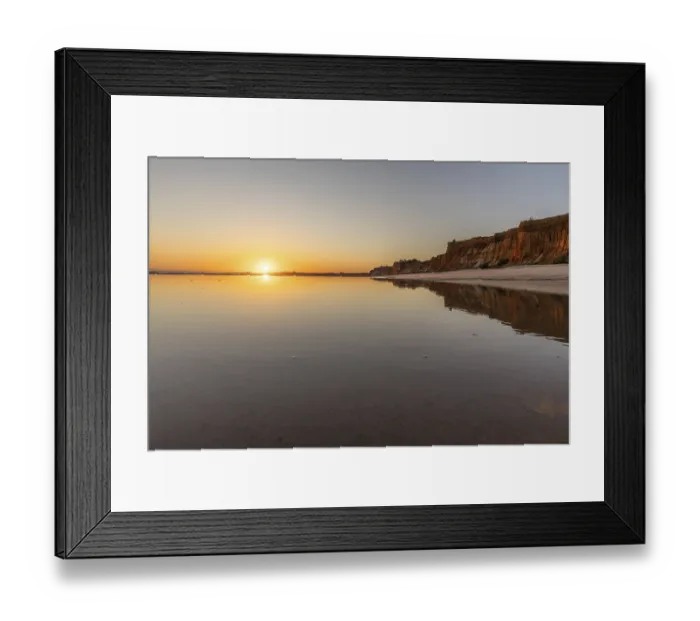 Framed Print : Sea with reflection at low tide in the calm waters of the Atlantic