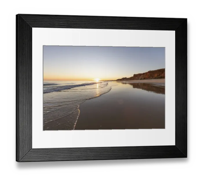 Framed Print : Sea with reflection at low tide in the calm waters of the Atlantic
