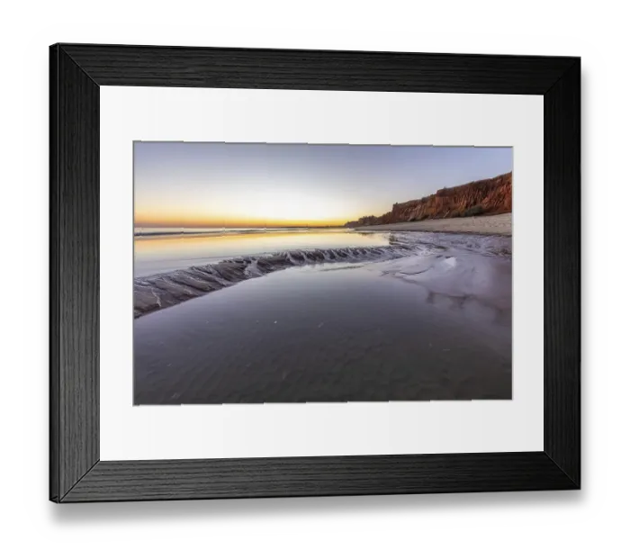 Framed Print : Sea with reflection at low tide in the calm waters of the Atlantic