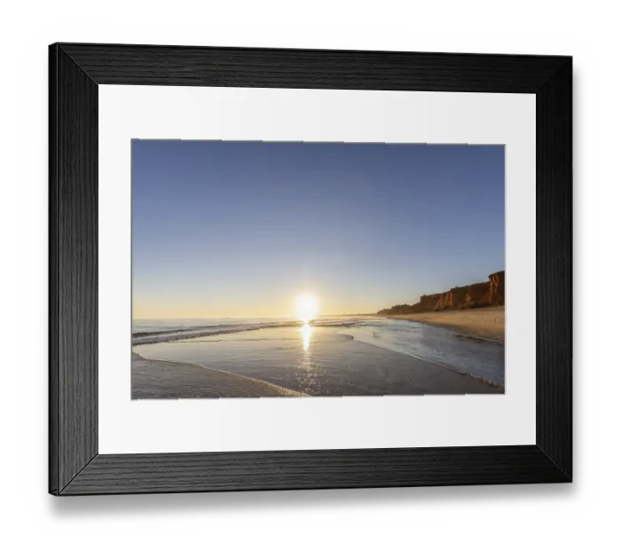 Framed Print : A landscape on the beach at low tide