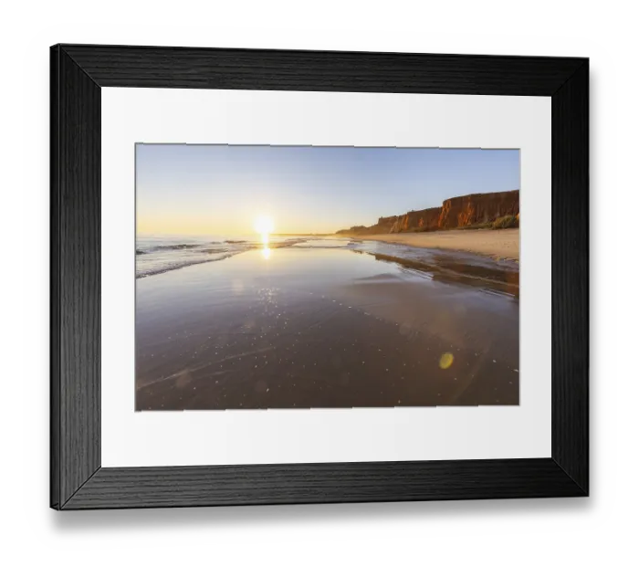 Framed Print : A landscape on the beach at low tide