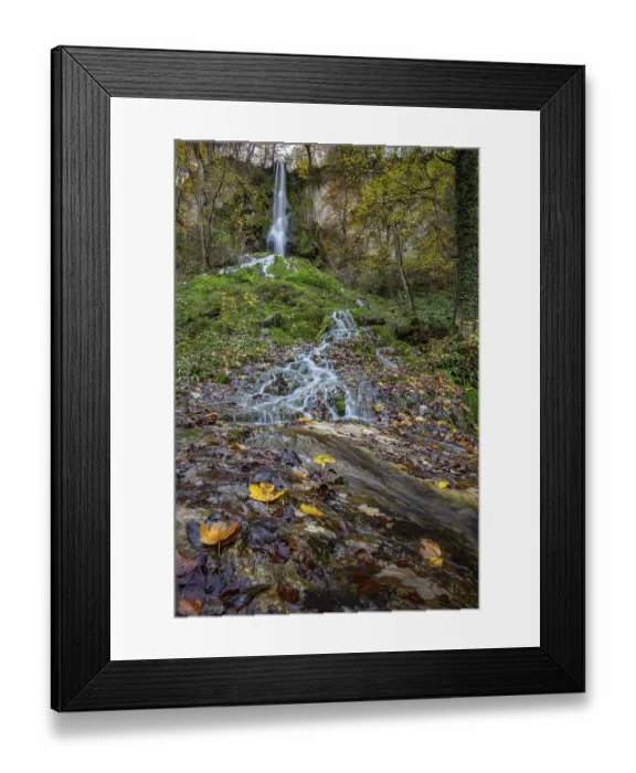 Framed Print : Waterfall in autumn in the middle of the forest