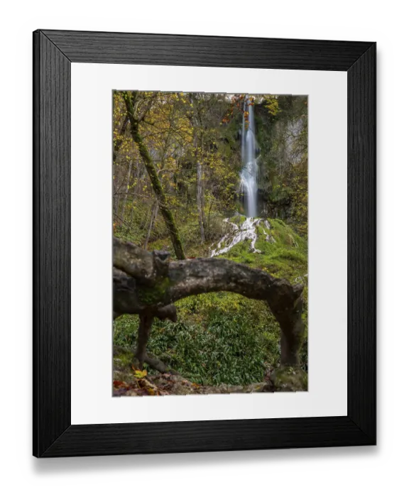 Framed Print : Waterfall in autumn in the middle of the forest