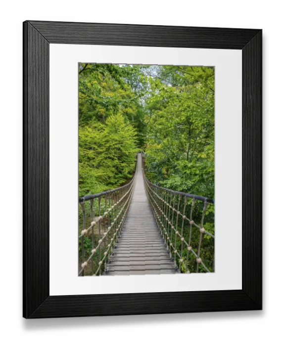 Framed Print : Wooden suspension bridge over a gorge Framed Print : Wooden suspension bridge over a gorge
