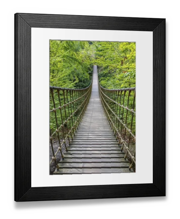 Framed Print : Wooden suspension bridge over a gorge Framed Print : Wooden suspension bridge over a gorge