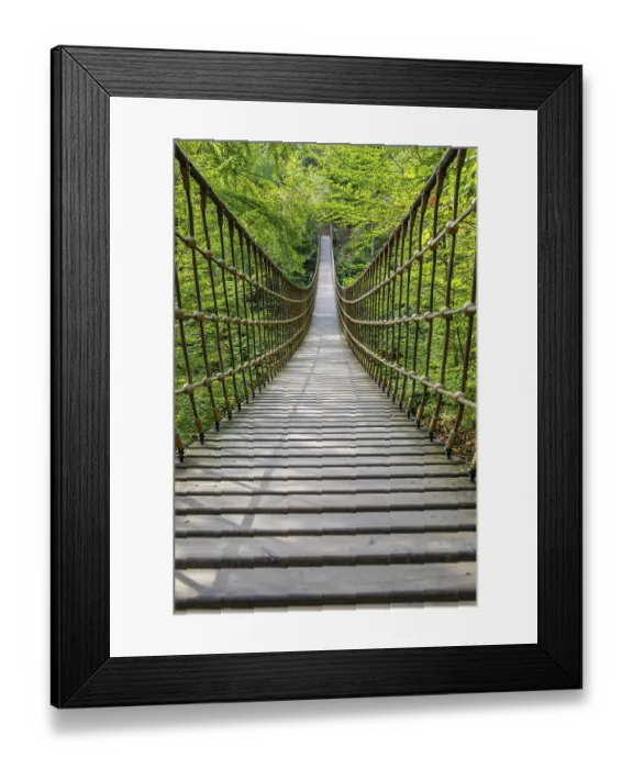 Framed Print : Wooden suspension bridge over a gorge Framed Print : Wooden suspension bridge over a gorge