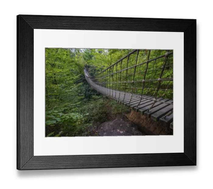 Framed Print : Wooden suspension bridge over a gorge Framed Print : Wooden suspension bridge over a gorge