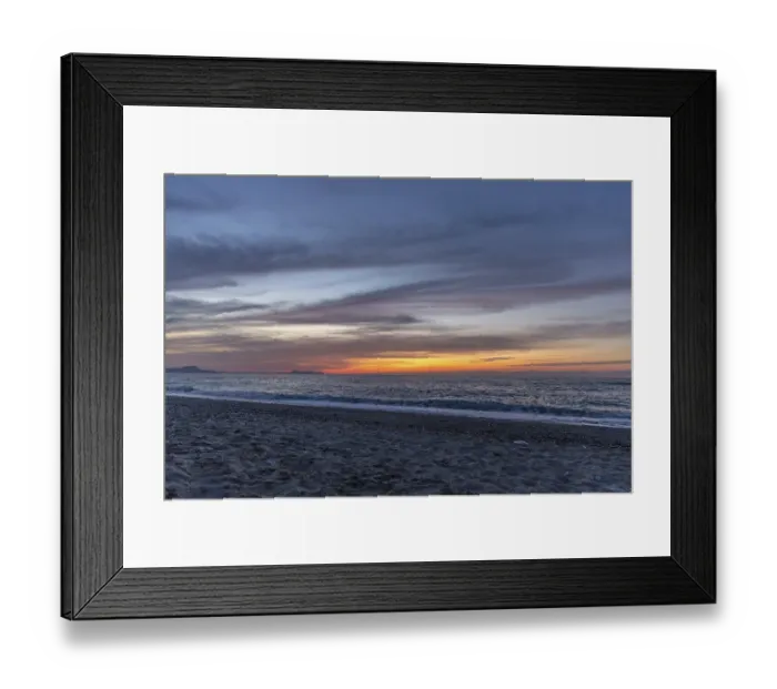 Framed Print : Beautiful coastline with a sandy beach and pebble beach at sunset Framed Print : Beautiful coastline with a sandy beach and pebble beach at sunset