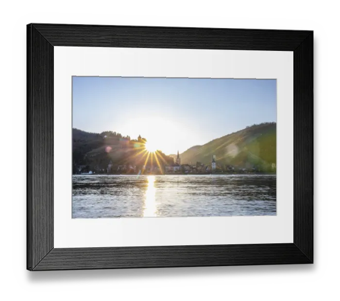 Framed Print : Sunset over the hills by the river