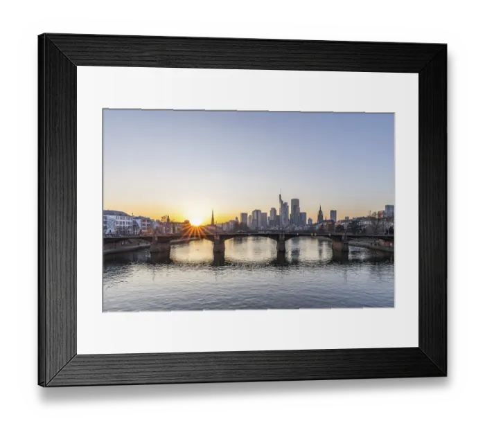 Framed Print : View over the river Main with a modern skyline in the background in the evening Framed Print : View over the river Main with a modern skyline in the background in the evening