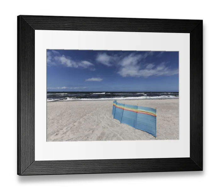 Framed Print : Deserted Baltic Sea beach with a single windbreak