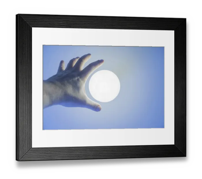 Framed Print : Male Hand Reaching a Illuminated Lamp on Ceiling in Switzerland