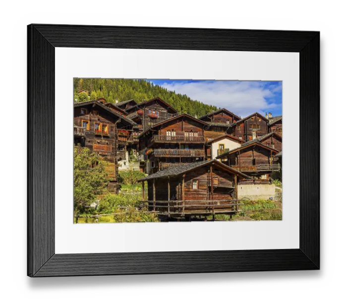 Framed Print : Old wooden houses in the historic village centre