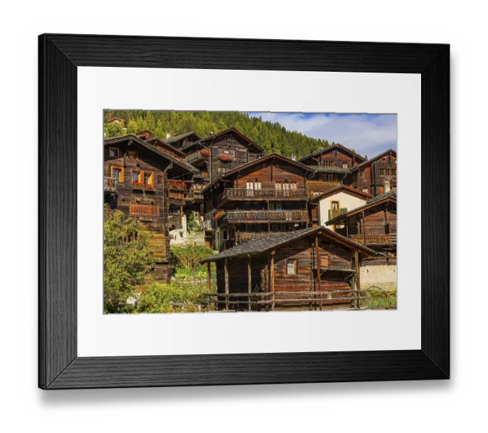 Framed Print : Old wooden houses in the historic village centre
