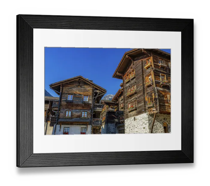 Framed Print : Old wooden houses in log construction