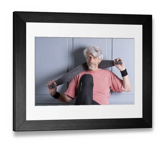 Framed Print : Elderly man with fitness outfit rests after training Framed Print : Elderly man with fitness outfit rests after training