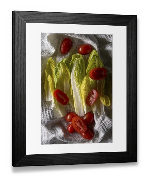 Framed Print : Chinese cabbage with cherry tomatoes on a white tea towel