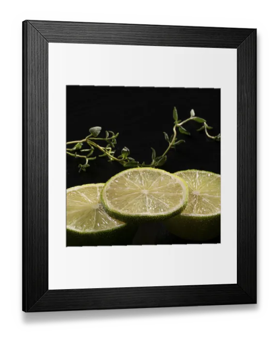 Framed Print : Three lime slices with green decoration