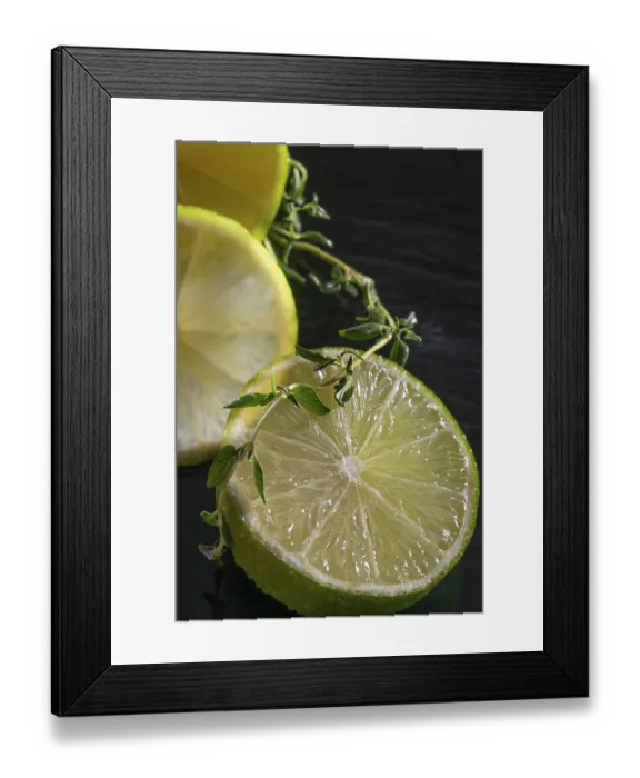 Framed Print : Lime slices with green decoration
