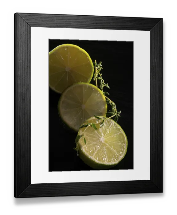 Framed Print : Three lime slices with green decoration