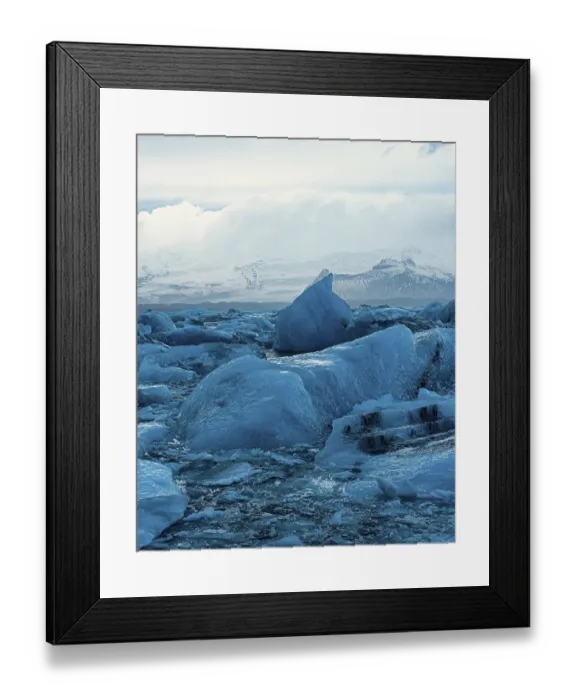 Framed Print : Expansive view of blue glaciers scattered across a wide icy landscape