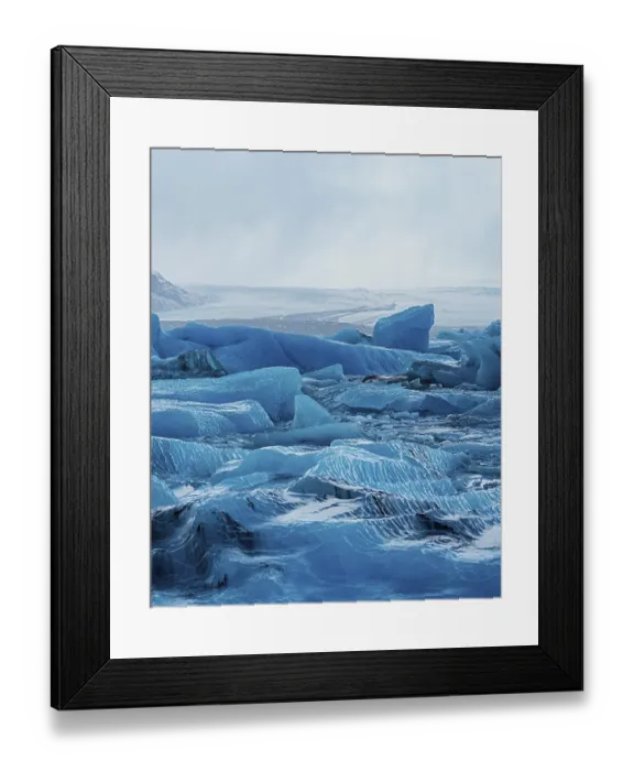 Framed Print : Detailed icy textures in a glacier field under an overcast sky