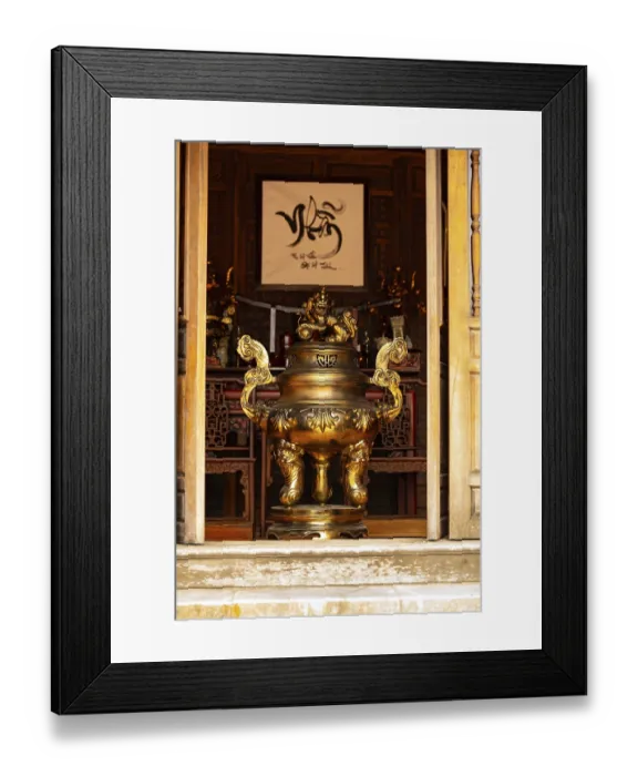 Framed Print : Golden incense burner prominently displayed in a traditional temple interior