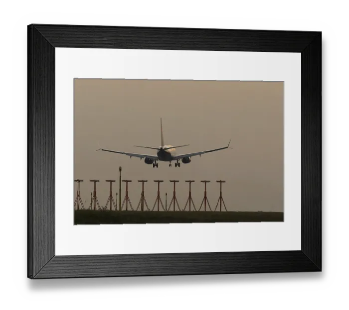 Framed Print : Boeing 737 jet passenger aircraft of Ryanair airlines in flight landing at sunset at London Stansted airport