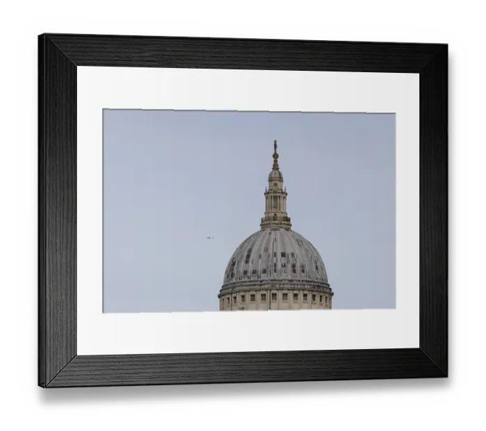Framed Print : Dome of St. Pauls cathedral with a jet aircraft in the sky behind Framed Print : Dome of St. Pauls cathedral with a jet aircraft in the sky behind