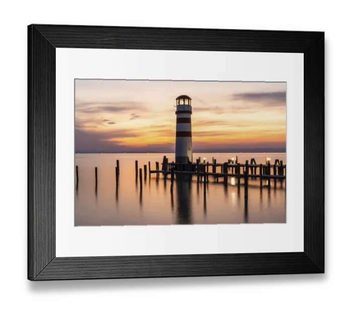 Framed Print : Sunset, lighthouse at sunset, long exposure