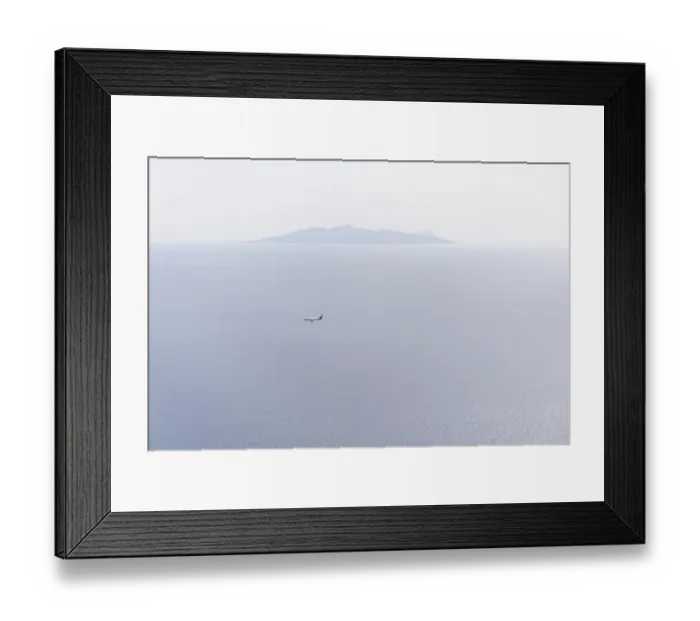 Framed Print : Aeroplane on landing approach, view of the island of Anafi