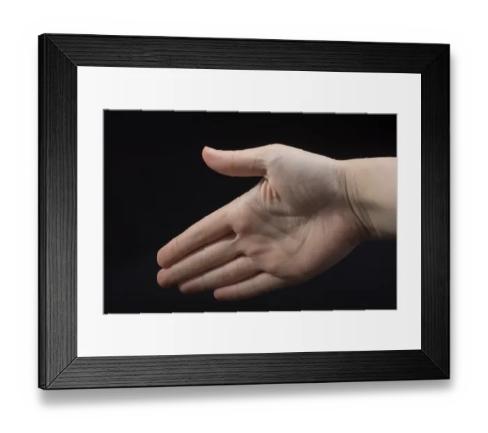 Framed Print : Five fingers of a child hand partly seen in black background