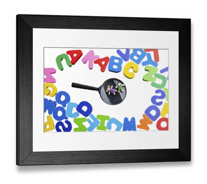 Framed Print : Colored wooden letters of the English alphabet on a white background