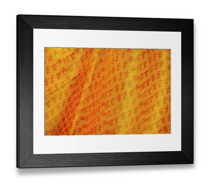 Framed Print : Close up of buddhist prayers on the yellow orange praying flag