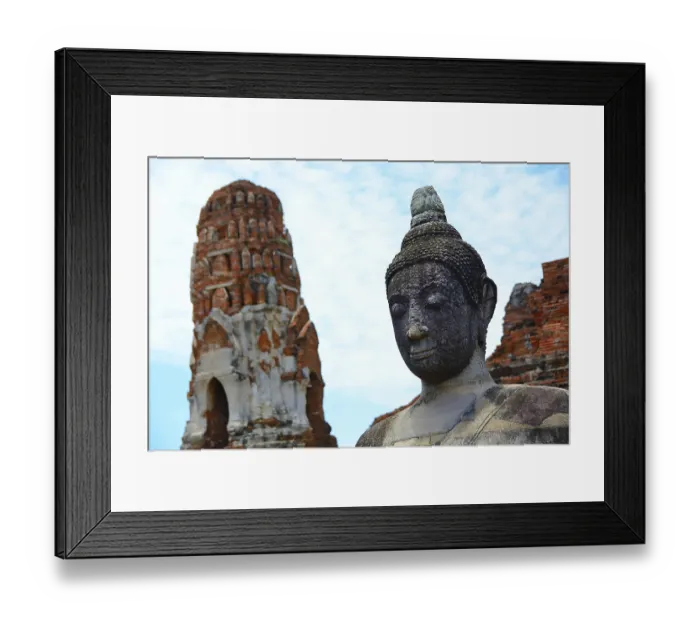 Framed Print : Serene buddha statue stands tall amidst ancient temple ruins