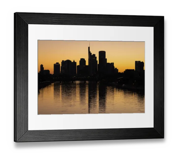 Framed Print : The sun sets behind the Frankfurt banking skyline Framed Print : The sun sets behind the Frankfurt banking skyline