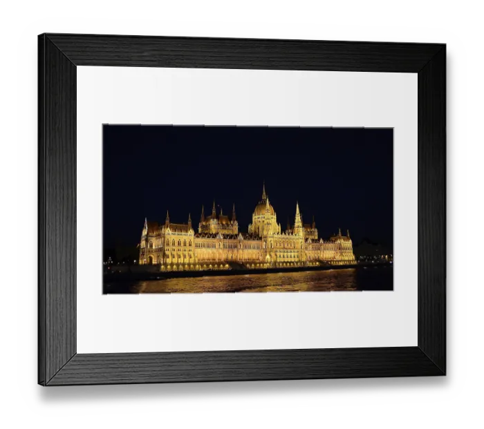 Framed Print : Golden lights highlighting the hungarian parliament building in budapest on the danube river at night Framed Print : Golden lights highlighting the hungarian parliament building in budapest on the danube river at night