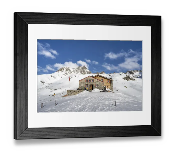 Framed Print : Chamanna d'Es-cha mountain hut in a wintry mountain landscape Framed Print : Chamanna d'Es-cha mountain hut in a wintry mountain landscape