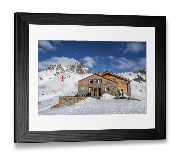 Framed Print : Chamanna d'Es-cha mountain hut in a wintry mountain landscape Framed Print : Chamanna d'Es-cha mountain hut in a wintry mountain landscape