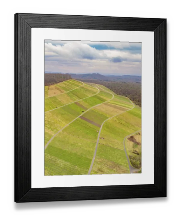 Framed Print : Winding hills and fields seen from the air
