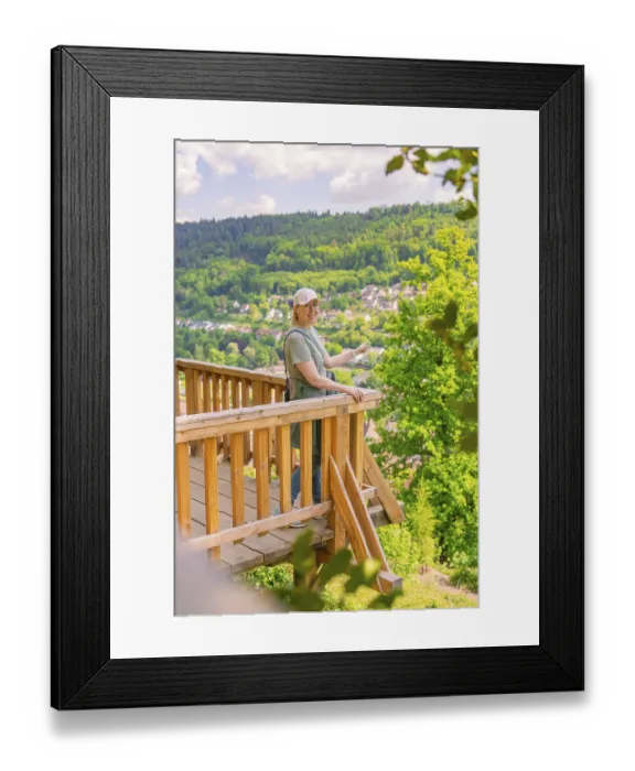 Framed Print : Woman on the platform presents the view over the valley and the surrounding hills