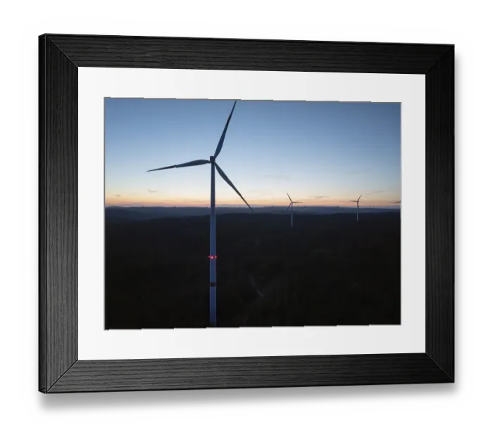 Framed Print : Several wind turbines on the horizon during a sunset Framed Print : Several wind turbines on the horizon during a sunset