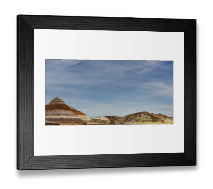 Framed Print : Straight road leading through desert landscape under vast sky inside the Petrified Forest National Park