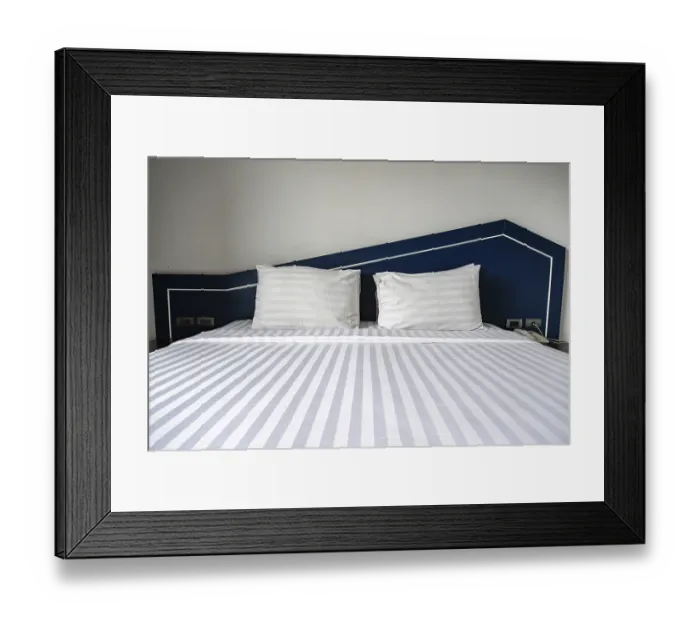 Framed Print : Hotel room double bed