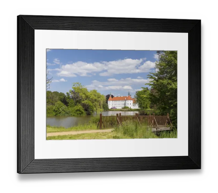 Framed Print : Castle pond and moated castle Furstlich Drehna